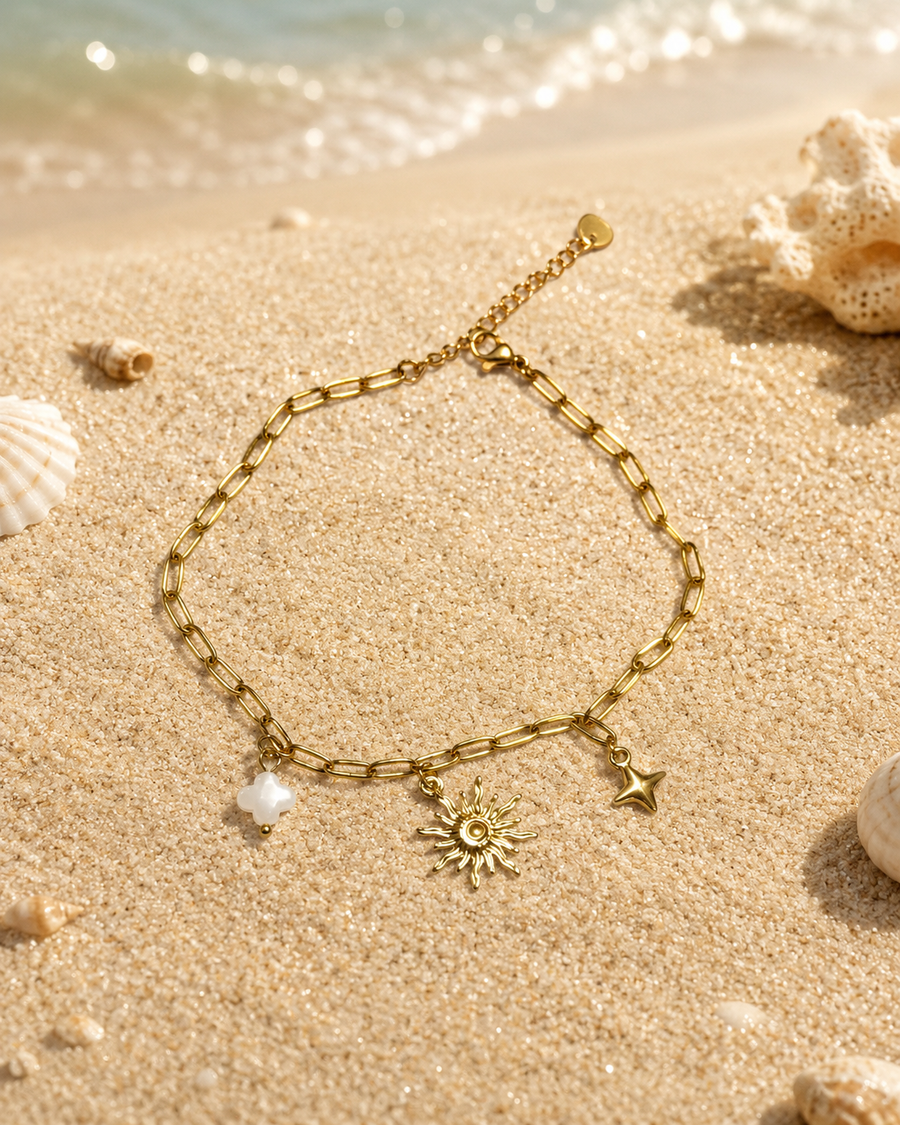 Bracelet de cheville acier inoxydable doré – charms soleil, étoile et trèfle blanc