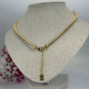 Gedraaide gouden stijve ketting van roestvrij staal – Modern en sculpturaal design.