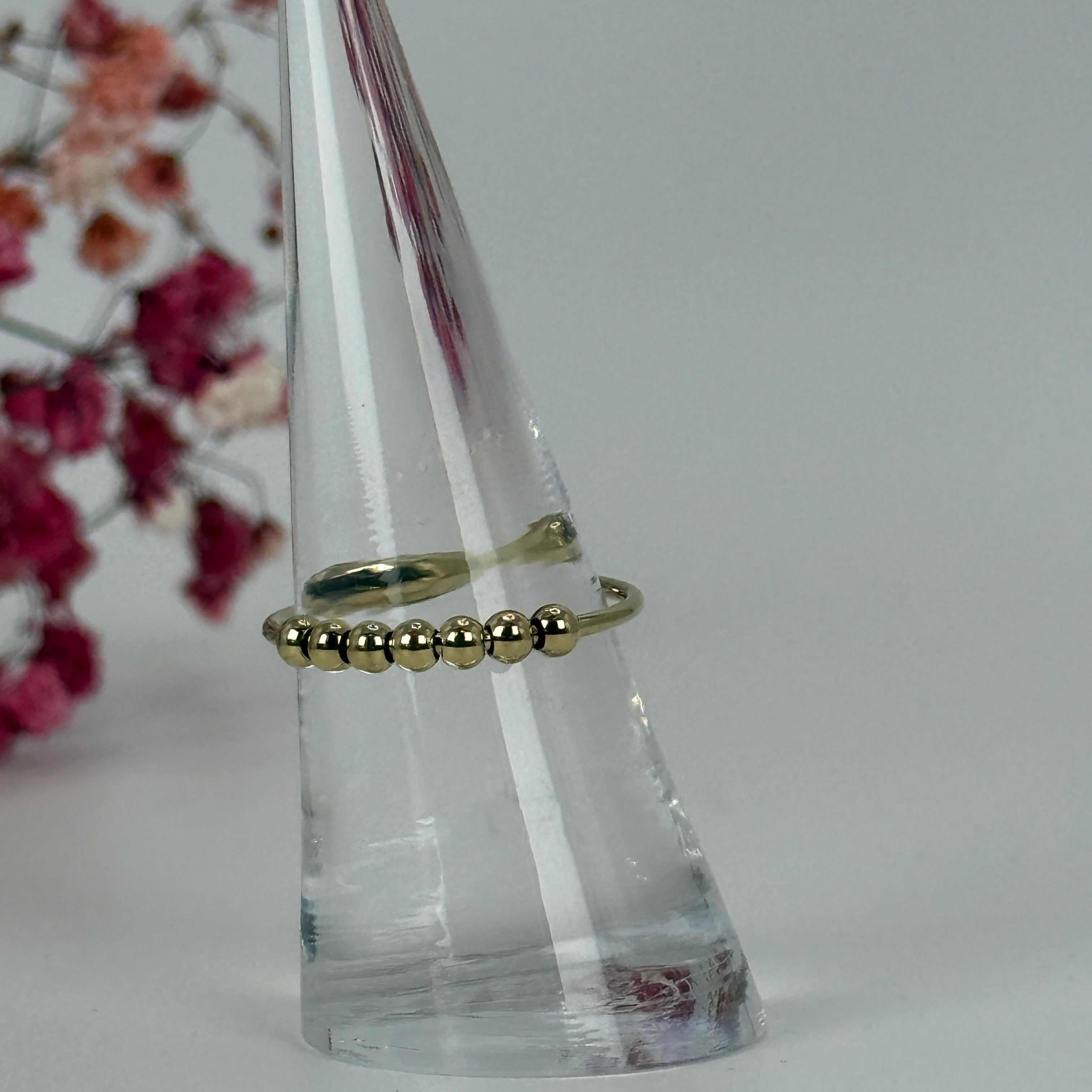 Verstellbarer Antistress-Ring aus gold- oder silberfarbenem Edelstahl – Rotierende Kugeln.
