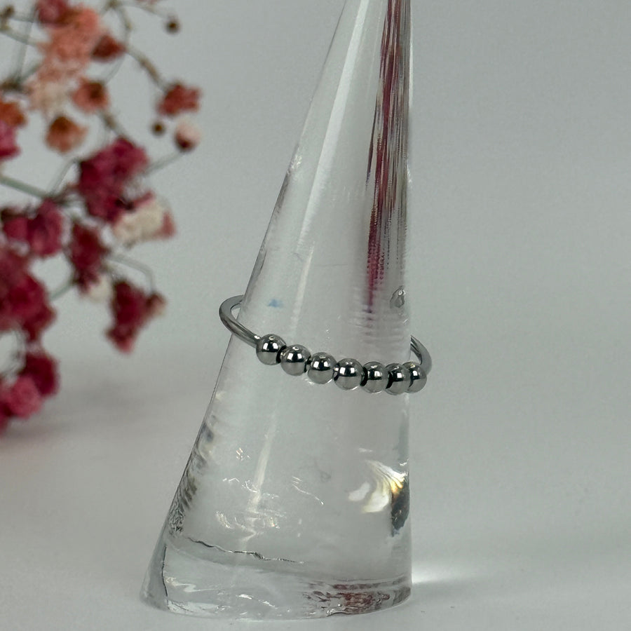 Bague ajustable anti-stress en acier inoxydable dorée ou argentée – Billes rotatives.