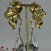Edelstahl-Blumenohrringe – Goldenes Blumendesign mit silbernen Troddeln