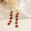 Boucles d’oreilles Chance rouges en acier inoxydable doré
