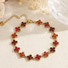 Bracelet Chance rouge en acier inoxydable doré