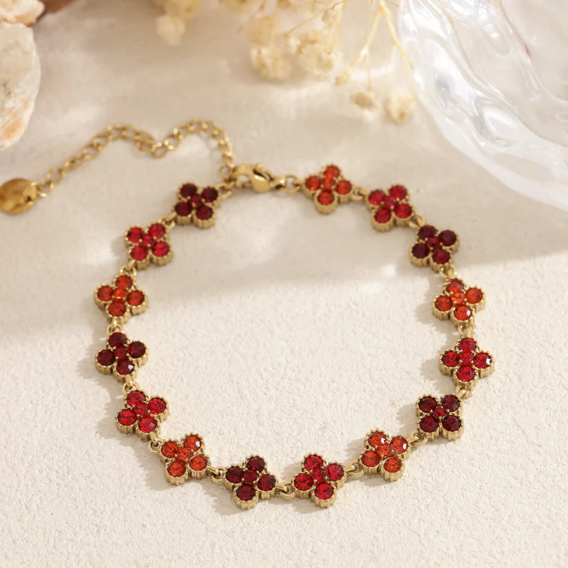 Bracelet Chance rouge en acier inoxydable doré