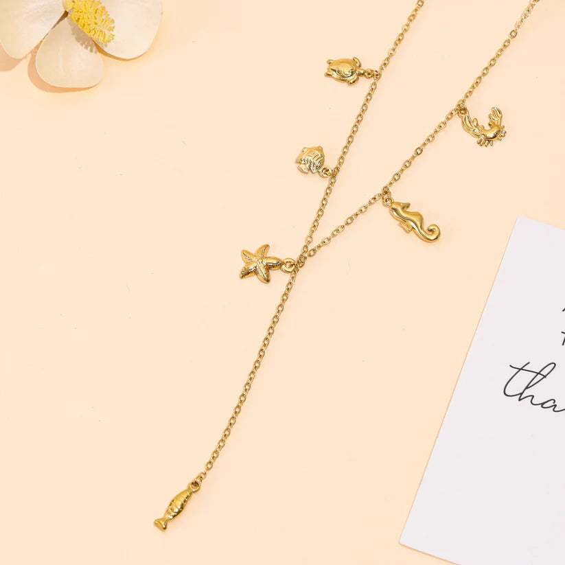 Collier Y charms marins doré en acier inoxydable