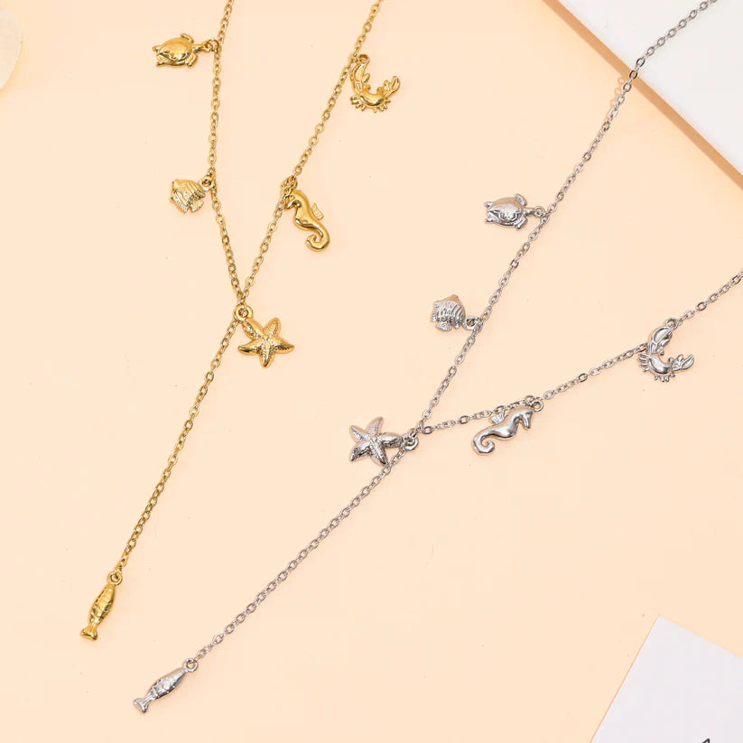 Collier Y charms marins doré en acier inoxydable