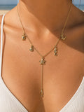 Collier Y charms marins doré en acier inoxydable