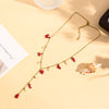 Collier Sautoir doré en Y à breloques fleurs et marines émaillé