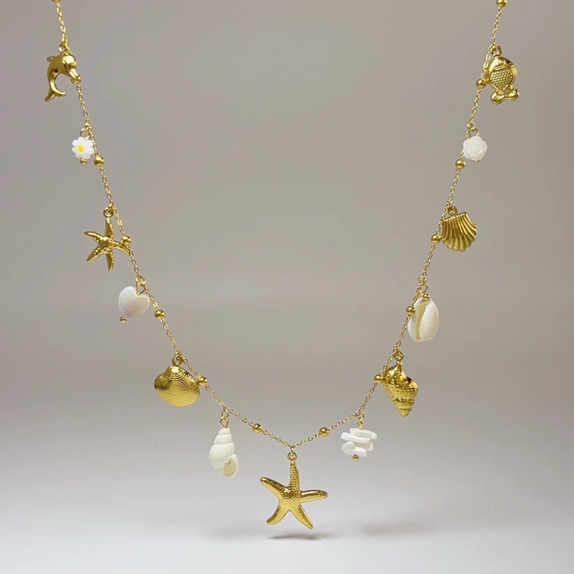 Collier sautoir doré charms coquillages et étoile de mer – acier inox