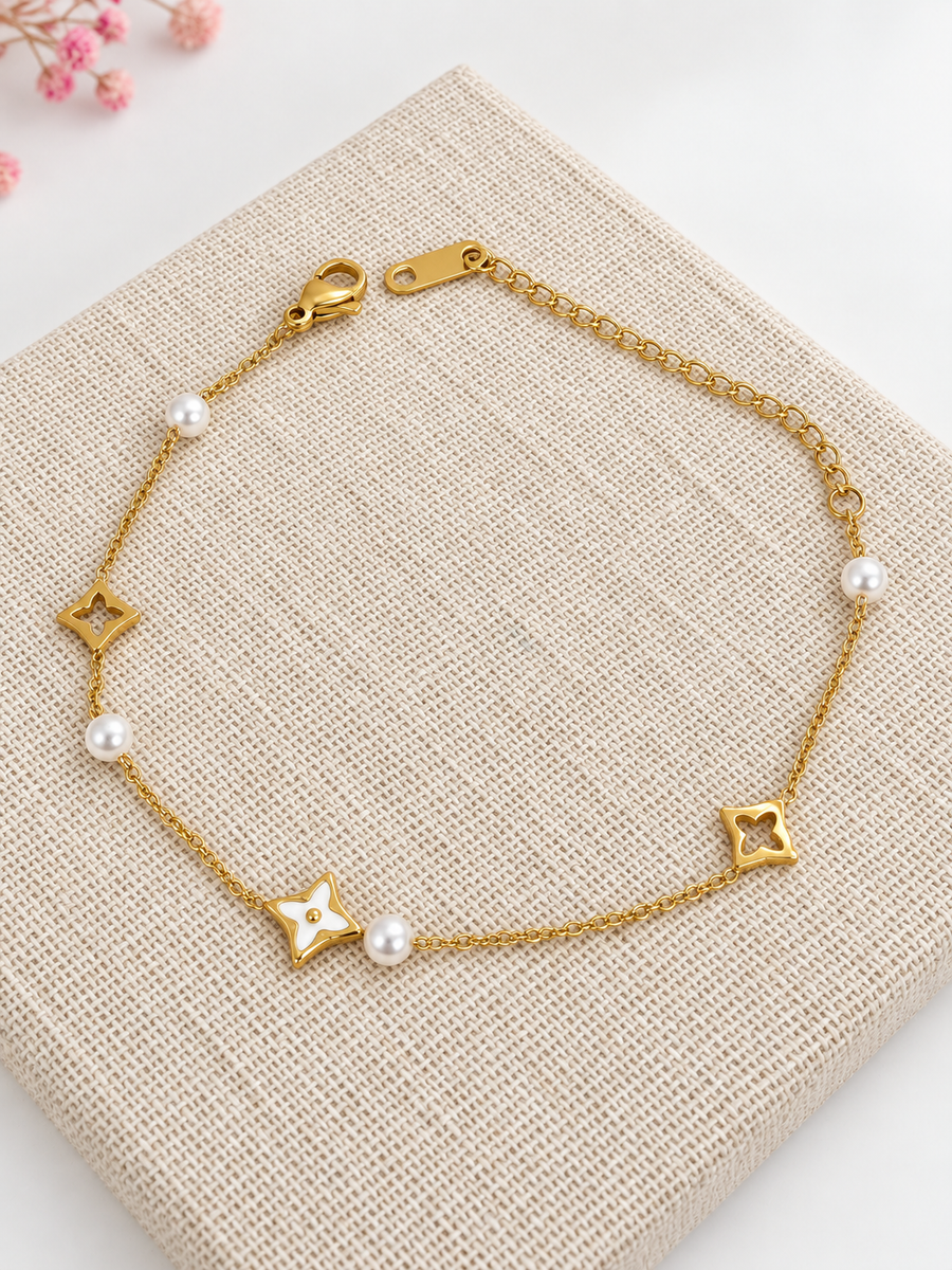 Fijne gouden roestvrijstalen damesarmband – trendy opengewerkte motieven