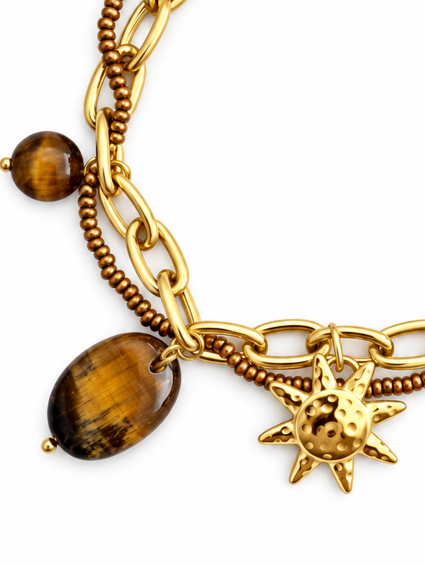 Goldfarbener, starrer Armreif aus Edelstahl – Anhänger im Ankerketten-Design.