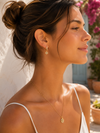 Boucles d’oreilles mini créoles soleil dorées – Acier inoxydable