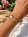 Bracelet charms fleurs dorées et fleurs roses en acier inoxydable doré ajustable