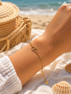 Bracelet fin cœurs dorés entrelacés en acier inoxydable – bijou femme élégant et intemporel