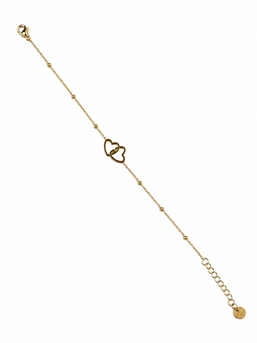 Bracelet fin cœurs dorés entrelacés en acier inoxydable – bijou femme élégant et intemporel