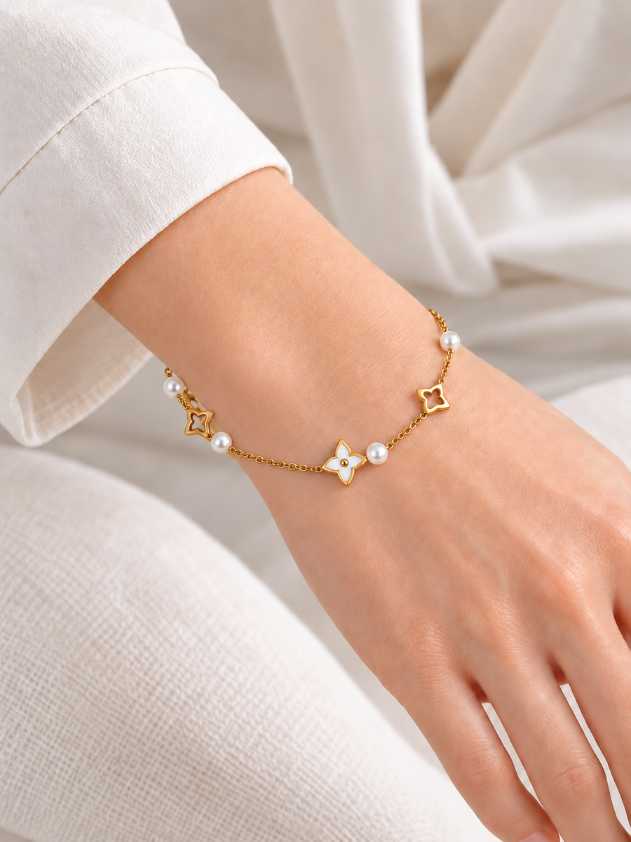 Fijne gouden roestvrijstalen damesarmband – trendy opengewerkte motieven