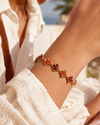 Bracelet Chance rouge en acier inoxydable doré