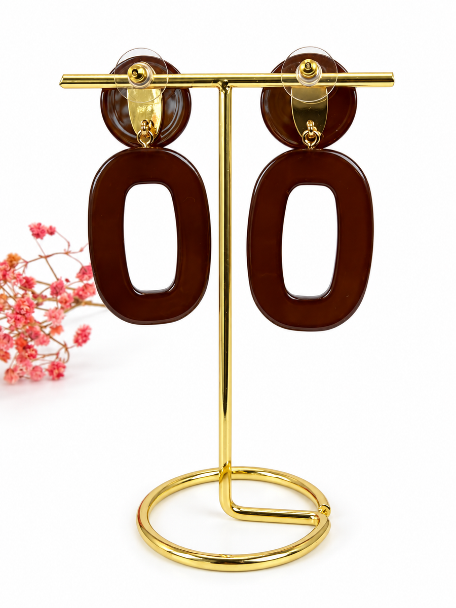 Boucles d’oreilles pendantes en résine ajourée – 5,5 cm