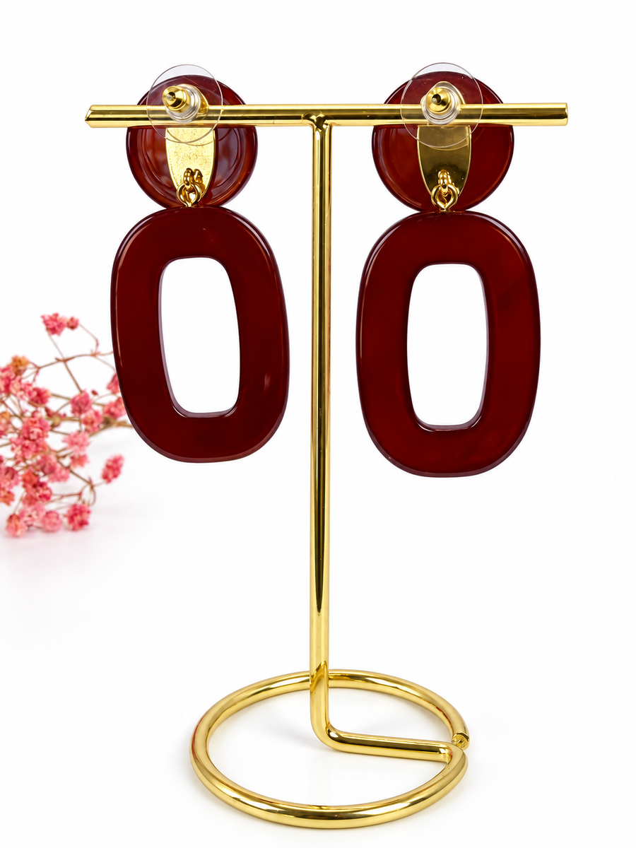 Boucles d’oreilles pendantes en résine ajourée – 5,5 cm