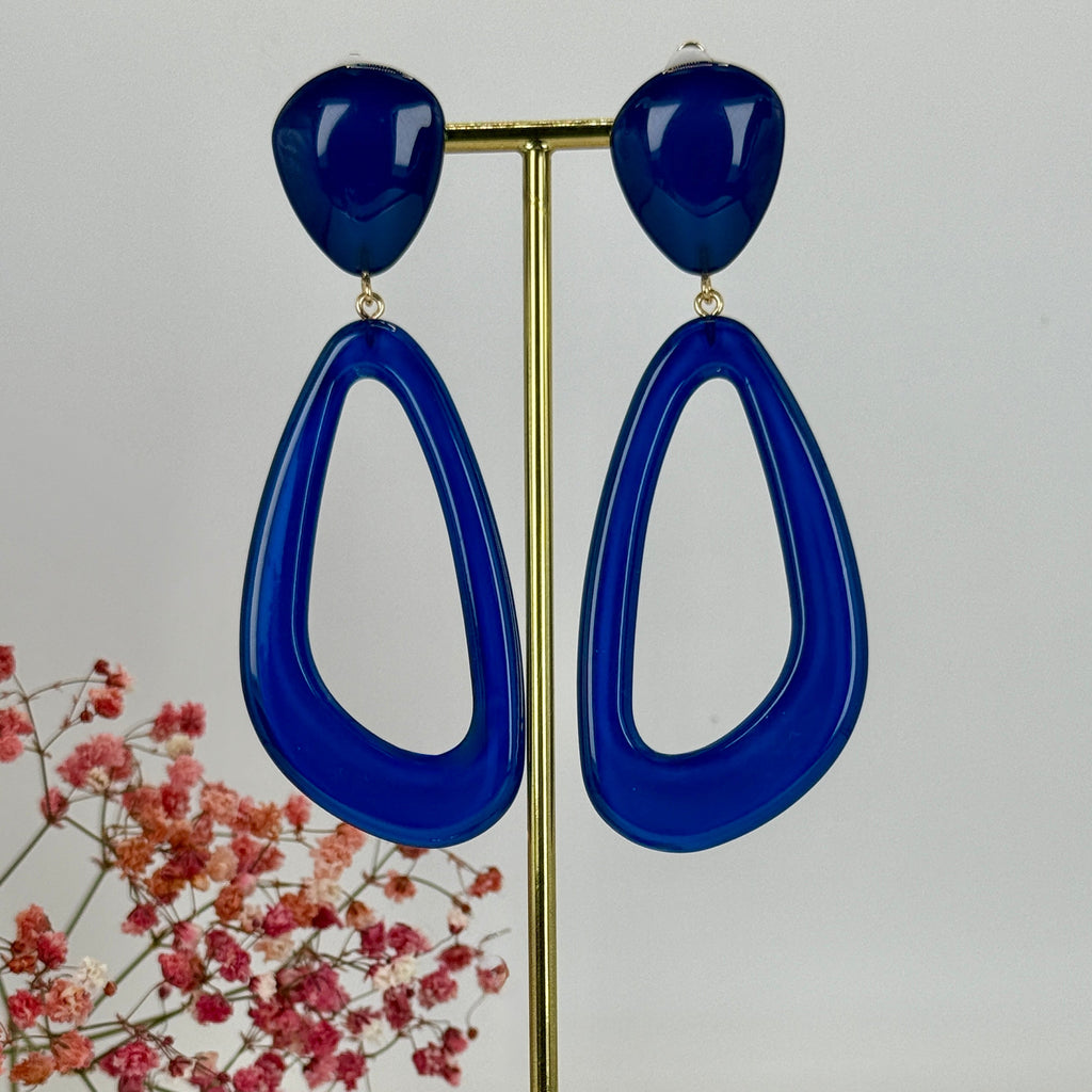Ovale clipoorbellen van blauwe hars.