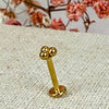 Piercing met drie balletjes - Goudkleurige oorstekers van roestvrij staal.