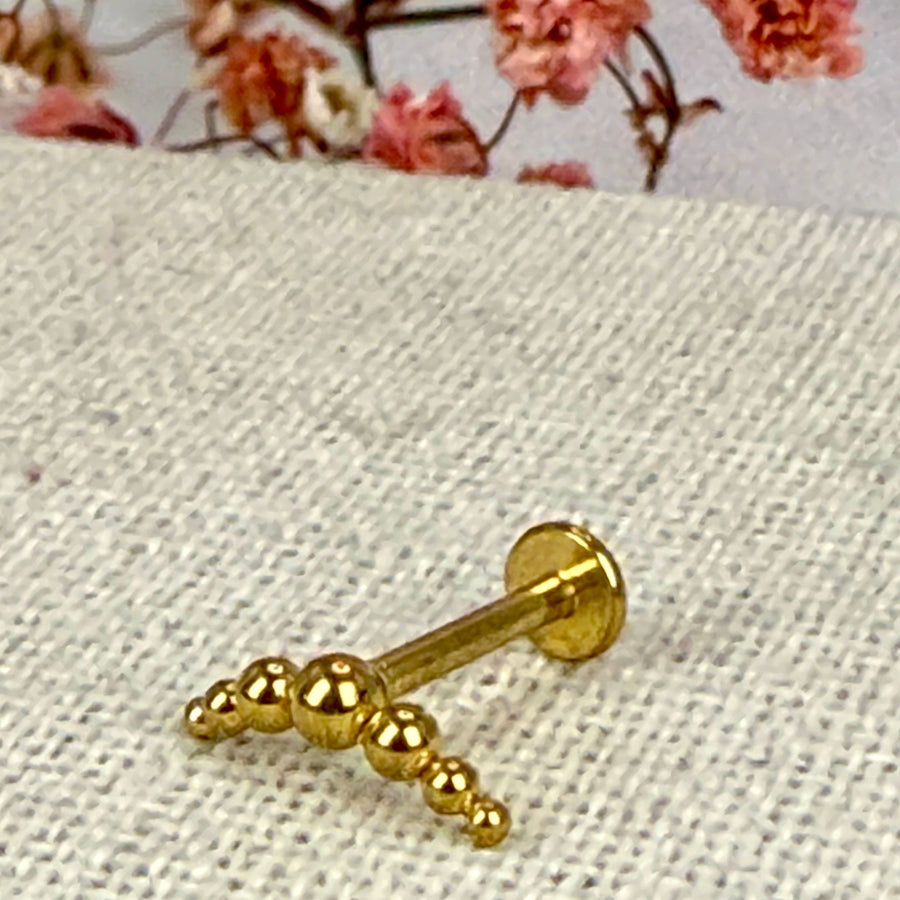 Gouden bolletjespiercing – Oorknopje van waterdicht roestvrij staal.