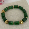 Elastische Armband van Cilindrisch Hars – Glanzende Parels & Gouden Details (Blauw, Groen of Rood).