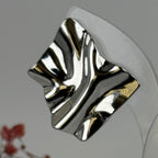Oorklemmen met geplooid effect, goud- of zilverkleurig – Hypoallergeen roestvrij staal.