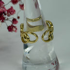Verstellbarer Ring aus vergoldetem Edelstahl – Vergoldete, ineinander verschlungene Ringe.