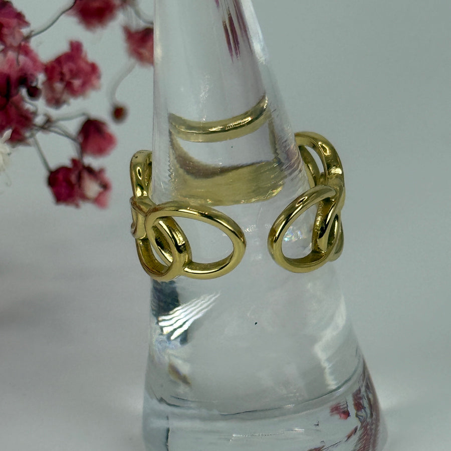 Bague ajustable en acier inoxydable dorée – Anneaux entrelacés dorés.