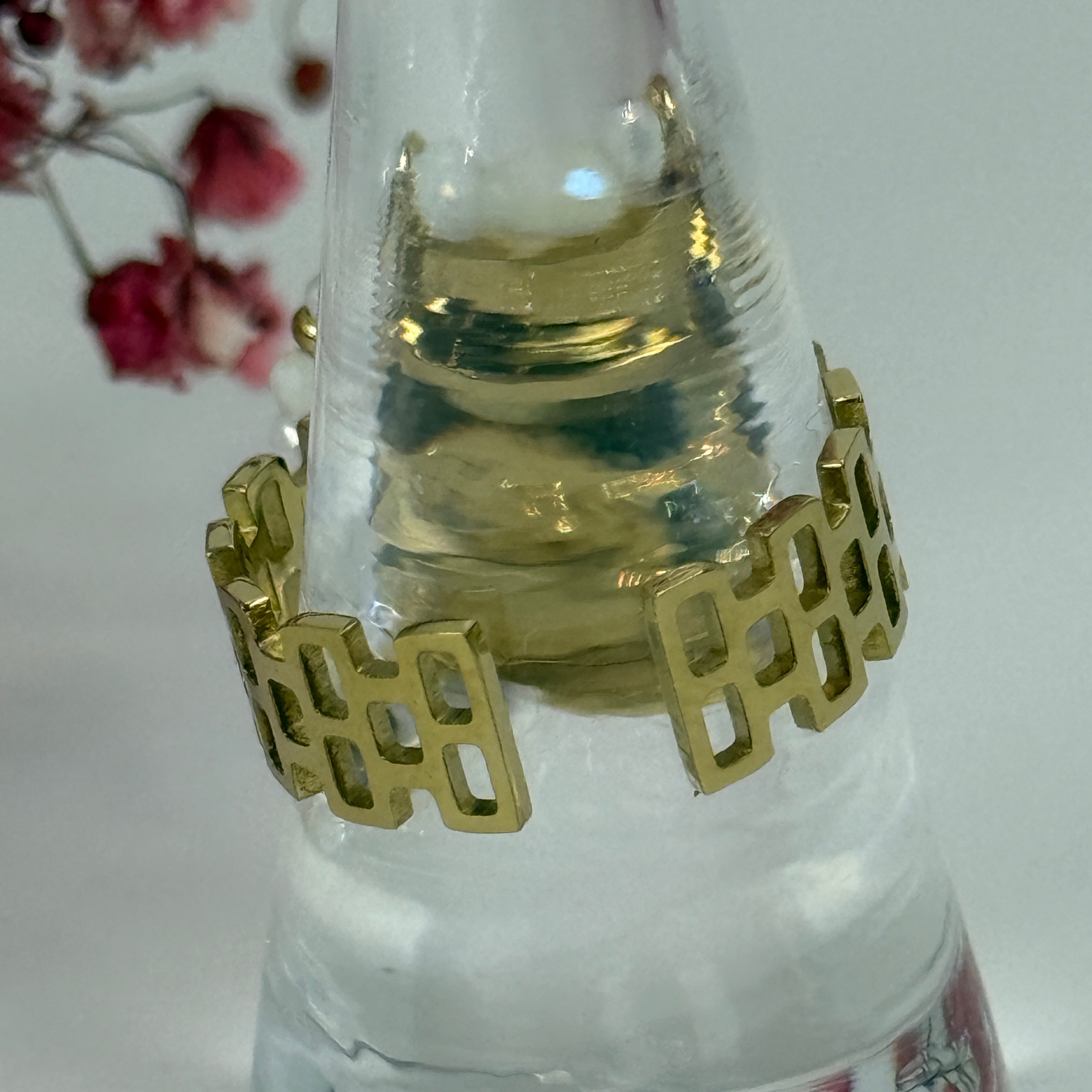 Drehbarer, verstellbarer Anti-Stress-Ring aus Edelstahl – goldfarben.