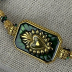 Bracelet cordon vert & noir – Médaillon doré cœur rayonnant