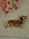 Broche chien teckel dorée en acier inoxydable