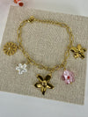 Bracelet charms fleurs dorées et fleurs roses en acier inoxydable doré ajustable