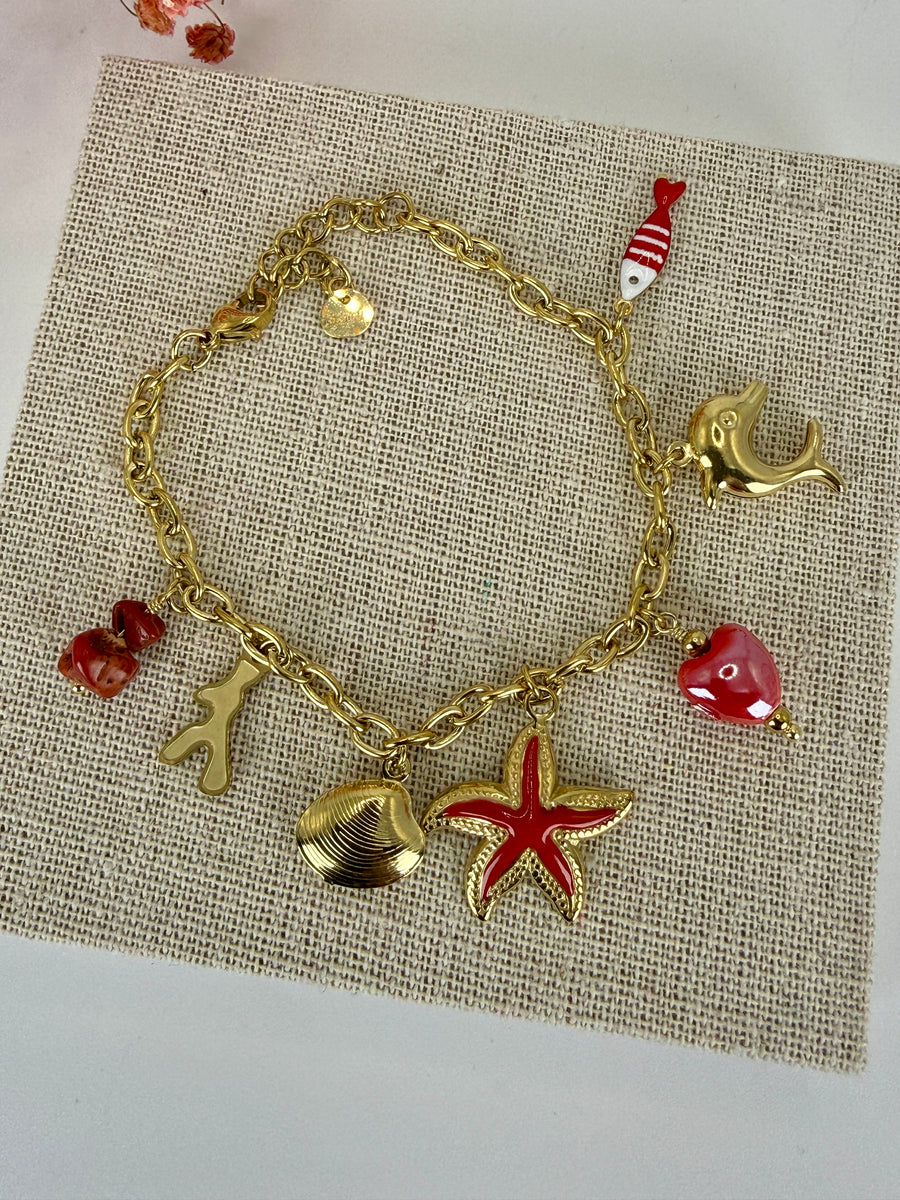 Bracelet charms marin rouge et coquillages en acier inoxydable doré ajustable