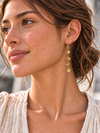 Boucles d’oreilles pendantes à pastilles martelées dorées – 6,5 cm