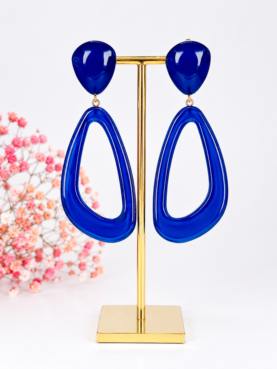 Ovale clipoorbellen van blauwe hars.
