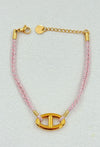 Bracelet chaîne d’ancre en acier inoxydable doré et corde rose