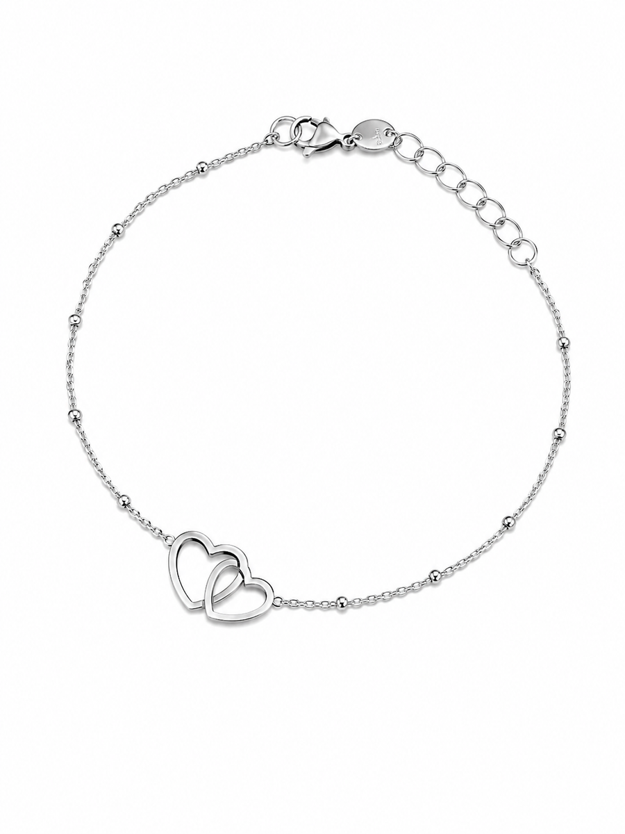 Bracelet fin cœurs argentés entrelacés en acier inoxydable – bijou femme élégant et intemporel
