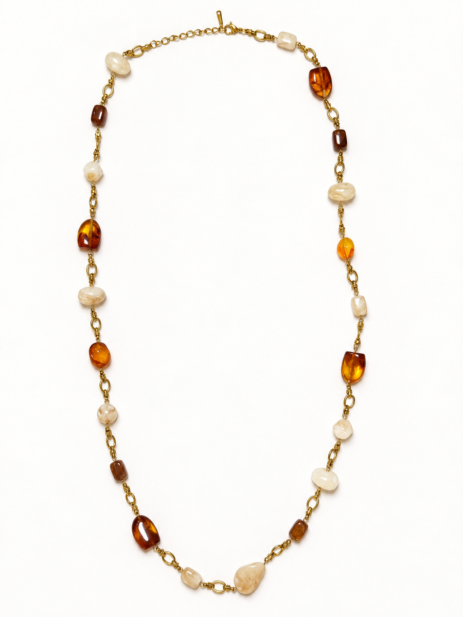 Collier Sautoir à perles ambre et écru marbré – 83 cm + 5 cm