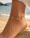 Bracelet de cheville acier inoxydable doré – charms soleil, étoile et trèfle blanc